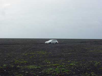 Lone car on the tundra
